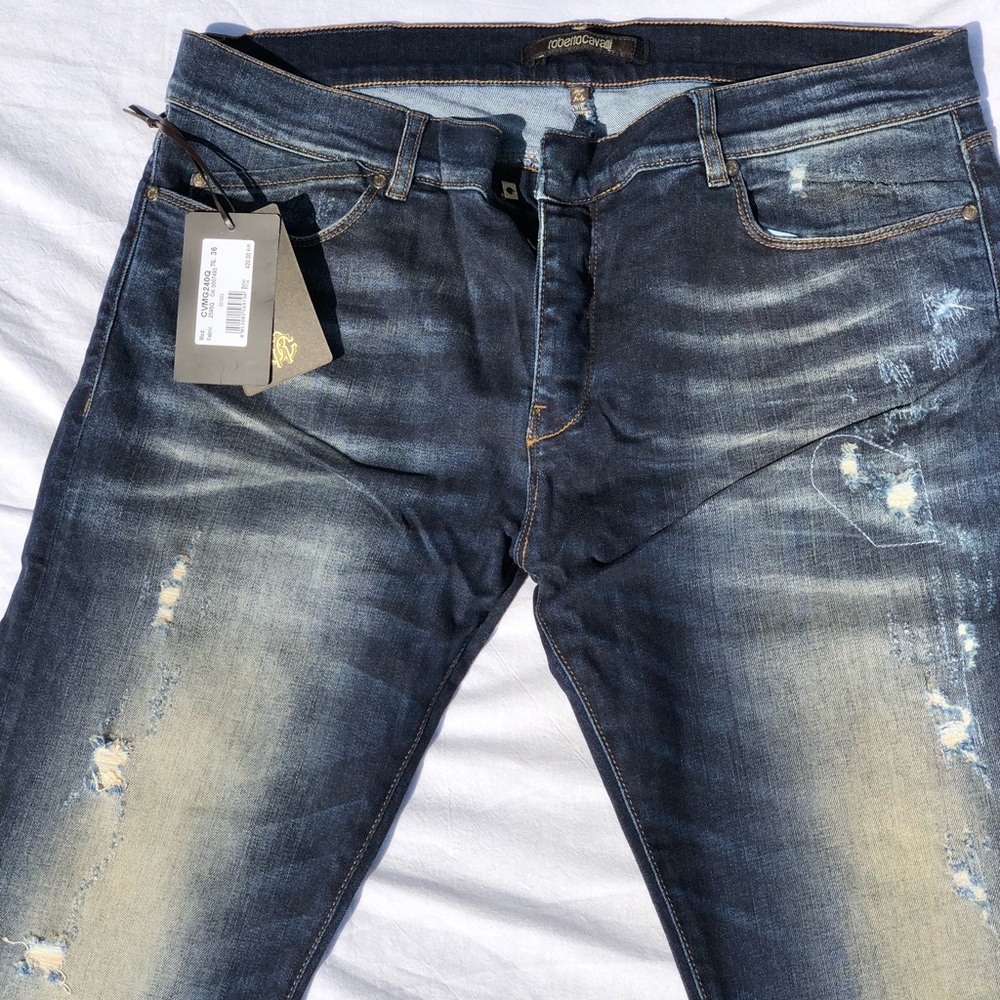 Roberto Cavalli blue jeans. NYT.